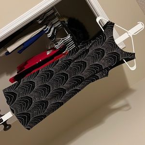 Cute dress, tight fitting but very stretchy and flattering